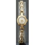 Rolex ladies 9ct gold wristwatch with gold hands and markers and textured face, on pierced bracelet,