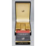 A boxed plated Dunhill lighter and two further Dunhill lighters,
