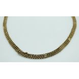 A 9ct gold three strand necklace, 16.