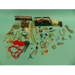 A collection of costume jewellery to include brooches, French jet, brooches, silver chain,