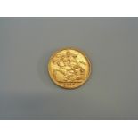 A 1907 gold sovereign,