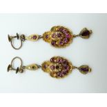 A pair of Victorian pinchbeck repoussé earrings set with pink paste and seed pearls