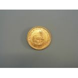 A 1962 gold two Rand South African coin