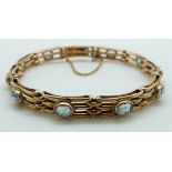 A 9ct gold Edwardian bracelet set with oval aquamarines, 10.