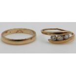 A 9ct gold wedding band and a 9ct gold ring set with cubic zirconia, 3.