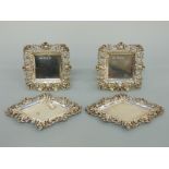 Two pairs of matching Victorian hallmarked silver pin dishes of square and diamond shape with