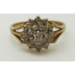 A 9ct gold ring set with diamonds in a cluster, 2.