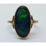 A 9ct gold ring set with opal triplet (size R)
