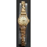 Rotary 9ct gold ladies wristwatch with baton markers and blued hands, on expanding metal bracelet,