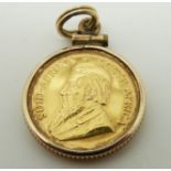 A 1/10 1980 Kugerrand in a pendant mount, 4.