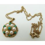 A 9ct gold pendant set with turquoise and seed pearls on a 9ct gold chain, 3.