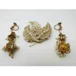A pair of Victorian gilt filigree earrings set with seed pearls
