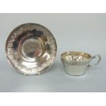 A French white metal cup and saucer, Paris maker Henri Soufflot (1884-1910),
