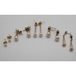 Four 9ct gold and pearl earnings