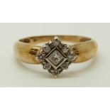 A 9ct gold ring set with a square cut diamond surrounded by round cut diamonds, 2.