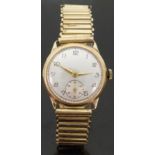 A 9ct gold gentleman's wristwatch with subsidiary seconds dial, Arabic numerals,