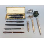 A collection of vintage pens including Swan, De La Rue pencil, Parker,