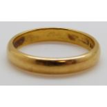 A 22ct gold wedding band, 5.