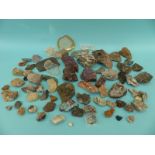 A box of geological specimens to include amethyst, tourmaline, hematite, garnet,
