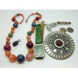 A beaded necklace made up of agate and lapis lazuli, pewter brooch, silver brooch,