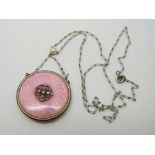 A Victorian pendant set with pink guilloche enamel,