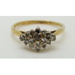 An 18ct gold ring set with diamonds, 2.