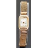 9ct gold ladies wristwatch with Arabic numerals and gold hands, on mesh bracelet, case size 14x22mm,