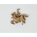 A 9ct gold charm/ pendant set with knight on a horse, 6.