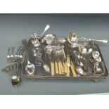 A collection of plated ware including a large galleried silver plated tray,