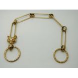 A Victorian fob chain made up of elongated links, engraved circular links and a fox's head, 37.