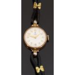 Tudor Royal 9ct gold ladies wristwatch with gold hands and Arabic numerals, on black leather strap,