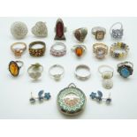 Fourteen silver rings including pearl set, amber,