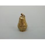 An exceptionally rare 17thC gilt metal pedestal pomander or spice holder with rope twist suspension