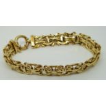 A 9ct gold bracelet in a plaited design, 9.