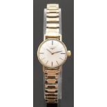 Longines gold plated ladies wristwatch with two tone hands and baton markers, on metal bracelet,