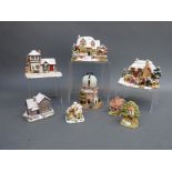 A collection of various sized Lilliput Lane cottages to include Sleigh Bells, Borrowdale School,