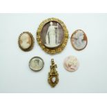 A yellow metal Victorian brooch set with a cameo within a leaf border,
