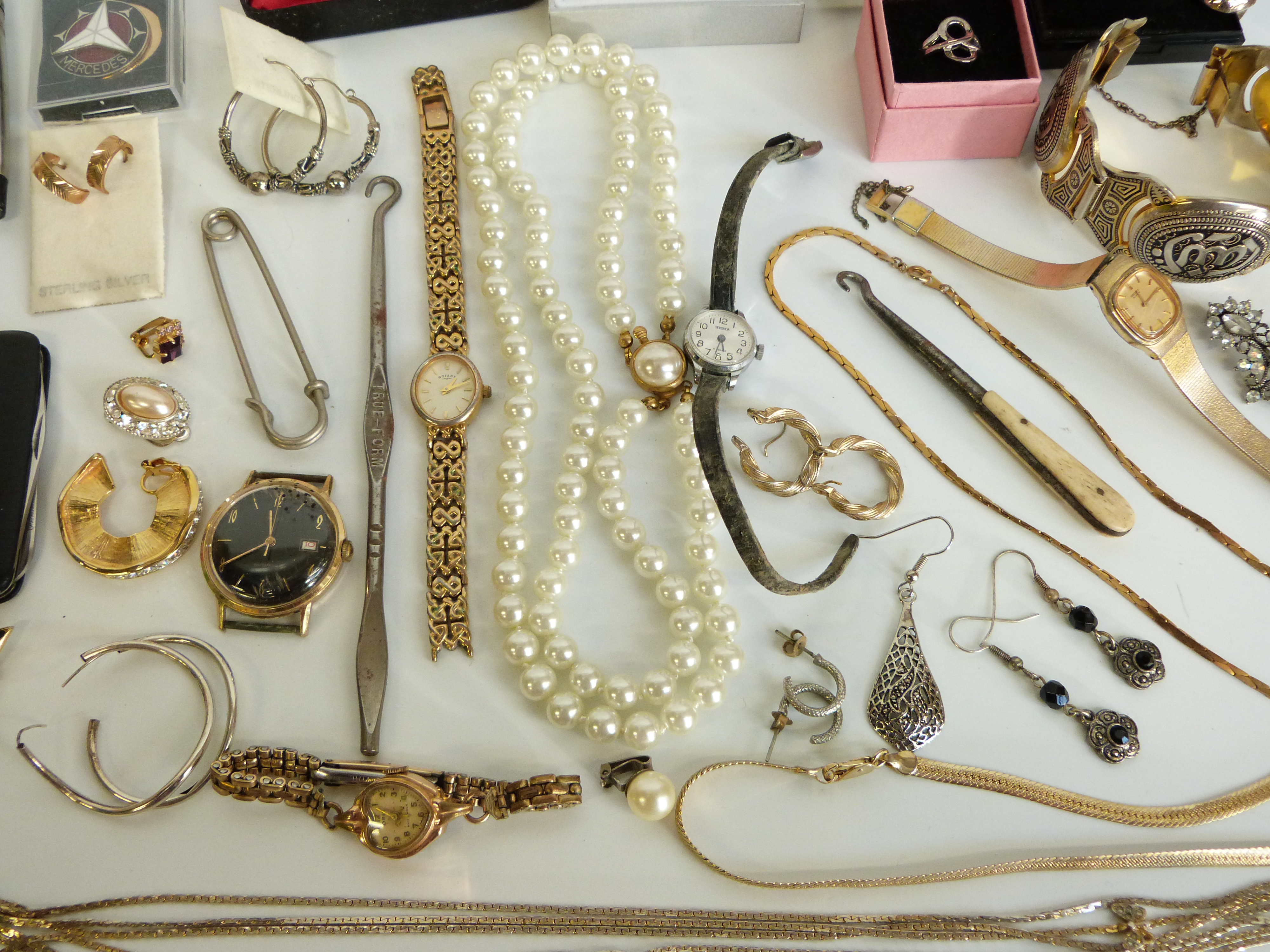 A collection of costume jewellery, watches, silver penknife, Zippo lighter, - Image 9 of 17