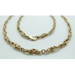 A 9ct gold necklace made up of cage links, 72cm, 34.