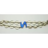 A silver bracelet of with white enamel leaves and a blue centre piece,