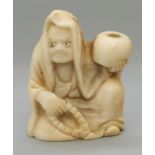 A Japanese Meiji period carved ivory netsuke of a man holding a bowl/gourd, 3.