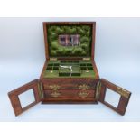 A late 19thC inlaid walnut jewellery box with fitted interior,