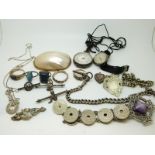 A silver fob watch, a silver Ingersoll watch, five silver rings, a Victorian swallow brooch,