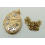 A 9ct gold locket with floral decoration and chain, 2.5 x 1.7cm, 1.