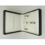 A 9ct gold pendant set with diamonds and peridot with matching earnings