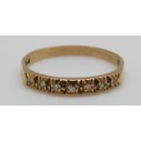 An 18ct gold ring set with diamonds (size O)