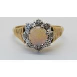 An 18ct gold ring set with an opal,