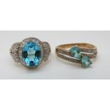 Two 9ct gold rings set with blue topaz and diamonds (size N and P)