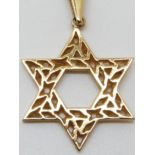 A 14k gold pendant and 9ct gold chain