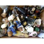 A box of old alcohol miniatures including Haig,